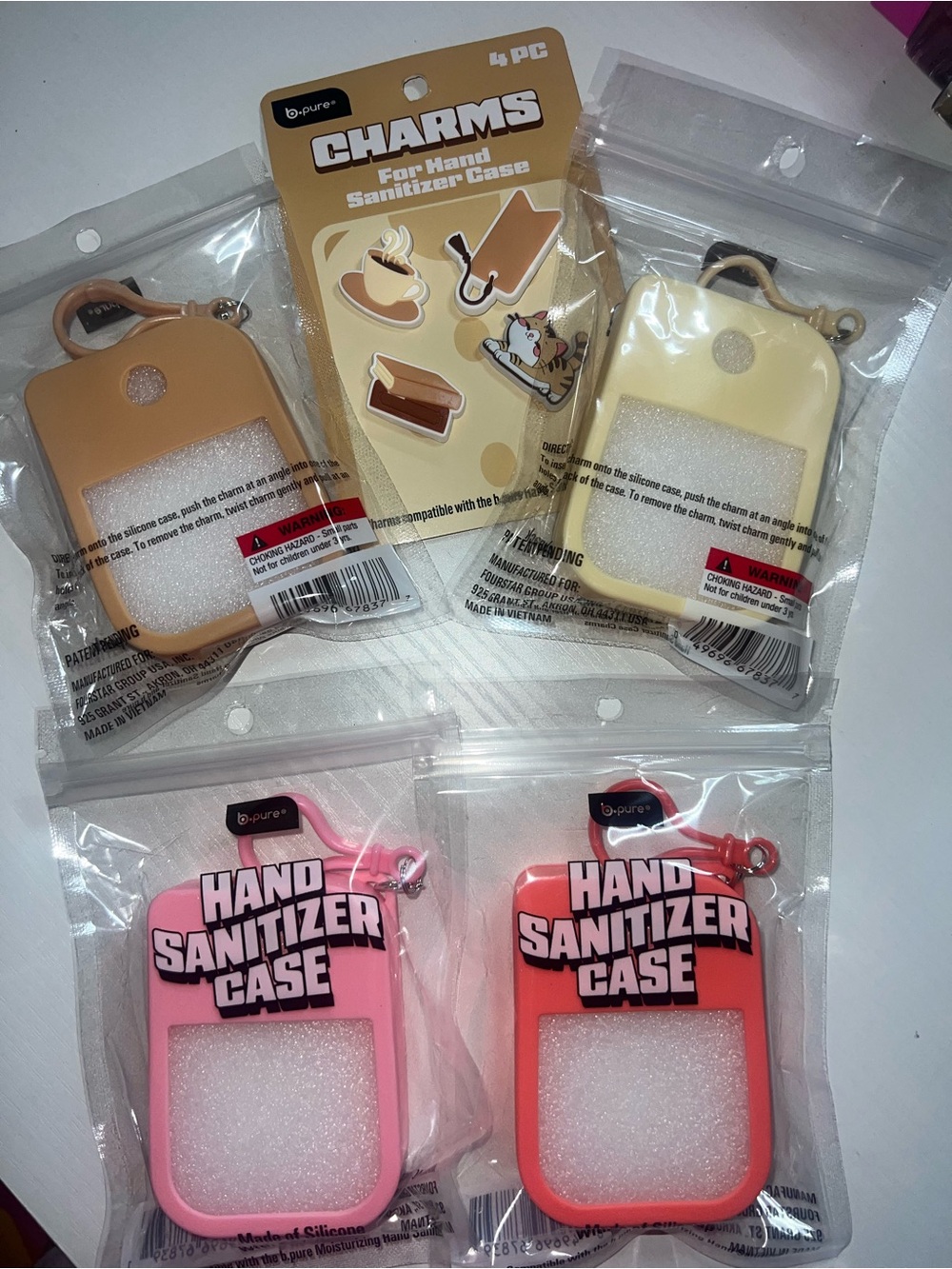b-pure Silicone Hand Sanitizer Case — Pink, Red, Tan, Cream